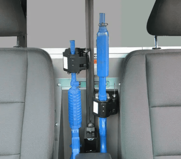 An image of a TRI-LOCK VERTICAL PARTITION MOUNT with a blue hose attached to it.