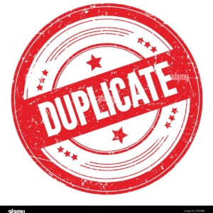 A red 1/2" Filler Plate with the word duplicate on it - stock image.