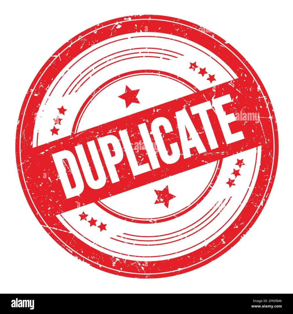 A red 1/2" Filler Plate with the word duplicate on it - stock image.