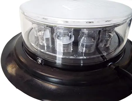 A Eight EVP 12 Hurricane Beacon Magnetic Mount LED with a white base on top of it.